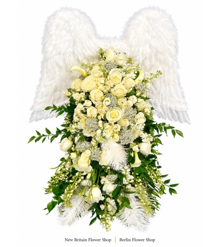 Heavenly Wings Floral Tribute - Deluxe. An arrangement by New Britain Flower Shop.