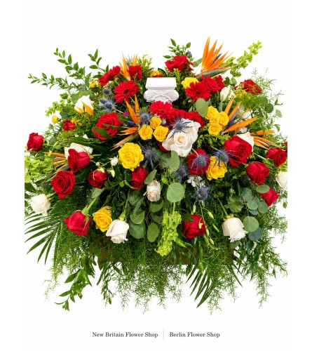 Celebration of Life Casket Spray - Deluxe. An arrangement by New Britain Flower Shop.
