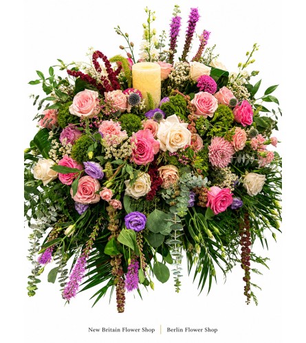 Garden of Cherished Memories Casket Spray - Deluxe. An arrangement by New Britain Flower Shop.