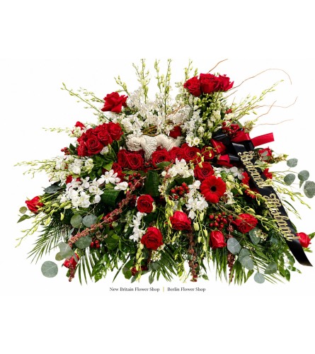 Eternal Devotion Casket Spray - Deluxe. An arrangement by New Britain Flower Shop.