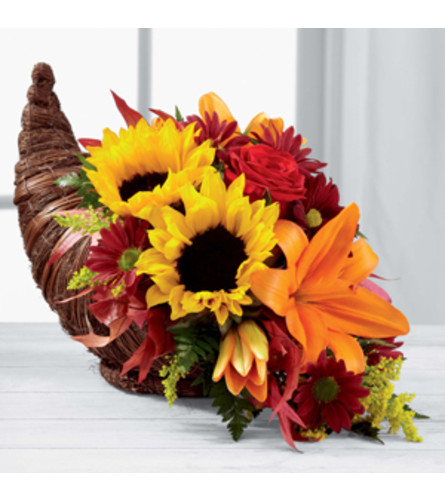 FALL CORNICOPIA. An arrangement by Fink Flowers Gifts and Flower Delivery.