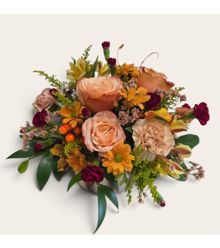 Enchanting Autumn Pumpkin. An arrangement by Flower Trends Florists.
