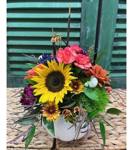 Sunny Embrace White Pumpkin Arrangement. An arrangement by Forest Florist.