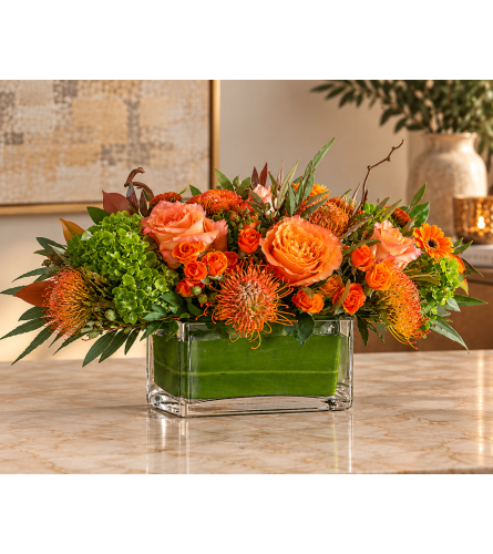 The Amberwood. An arrangement by Bill's Flowers Arrangements.