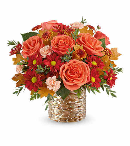 Teleflora's Chic Copper Bouquet - Deluxe. An arrangement by Marivel's Florist and Gifts.