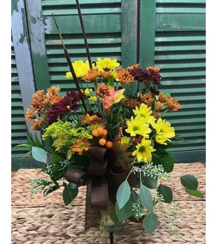 Rustic Joy Arrangement. An arrangement by Forest Florist.