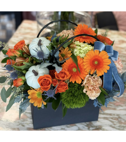 Sunset Harvest Bloom Bag - Deluxe. An arrangement by New Britain Flower Shop.