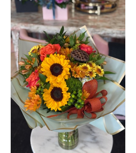 Sunlit Embrace Bouquet - Deluxe. An arrangement by Berlin Flower Shop.