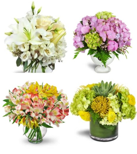 Centerpiece Examples - Deluxe. An arrangement by Belmar Flower Shop Inc..