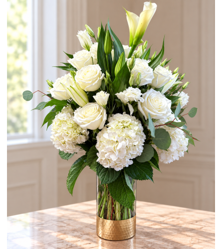 Ivory Garden. An arrangement by Sonia's Florist.