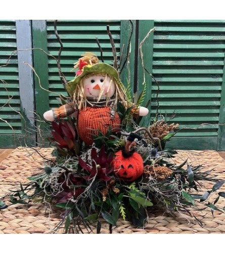 Heartfelt Autumn Scarecrow. An arrangement by Forest Florist.