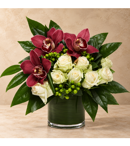 Burgundy and' Emerald Wonders. An arrangement by Bill's Flowers Arrangements.