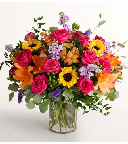 The Floral Embrace™ Luxe - Deluxe. An arrangement by Flowers of Jacksonville.