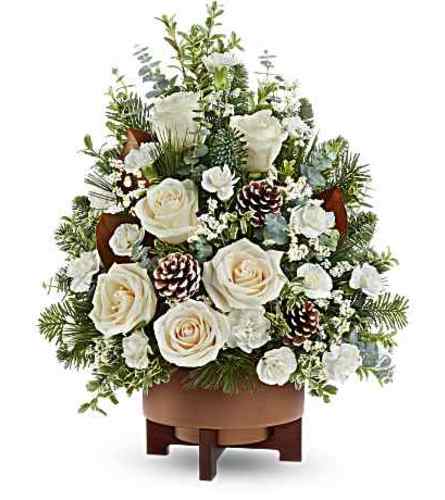 The Teleflora's Alpine Snow Tree - Deluxe. An arrangement by Marivel's Florist and Gifts.