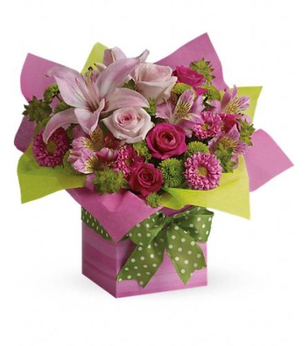 Pretty Pink Present TF. An arrangement by Belak Flowers.