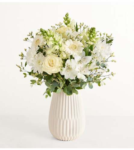 Treasured Memories™ All White - Deluxe. An arrangement by Flowers of Charlotte.