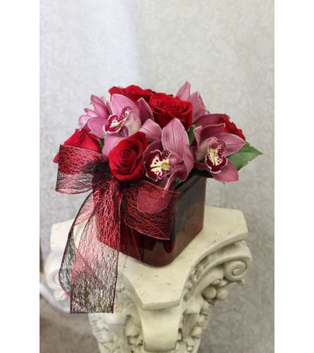 Rosy Valentine Delight. An arrangement by Clark's House of Flowers.