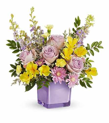 The Teleflora's Pastel Paradise Bouquet - Deluxe. An arrangement by Marivel's Florist and Gifts.