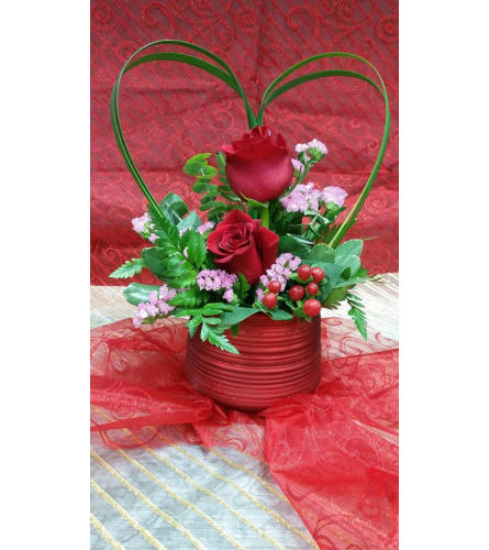 Sweethearts. An arrangement by Avenida Flowers.