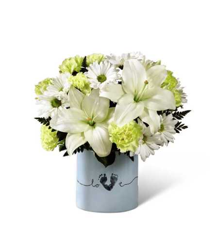 The FTD® Tiny Miracle™ New Baby Boy Bouquet - Standard. An arrangement by Royal Louis Florist.