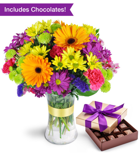 Deliciously Sweet Radiant Bundle - Standard. An arrangement by Lily Pad Florist. Daisies, alstroemeria, carnations, and more are arranged in every...