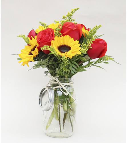 Mason Jar Medley. An arrangement by Flowers by Peter.