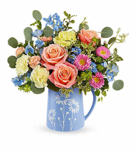 The Teleflora's Daisy Dreams Bouquet - Deluxe. An arrangement by Marivel's Florist and Gifts.