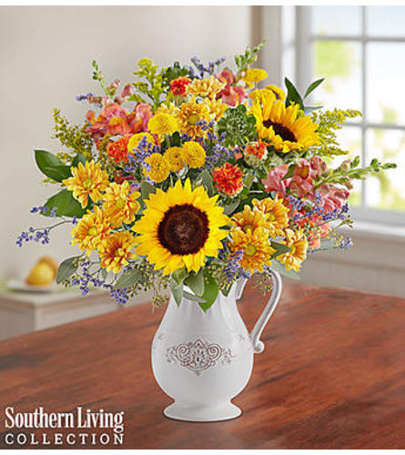 Fall Farmhouse Pitcher by Southern Living®. An arrangement by Garden of Eden Floral.