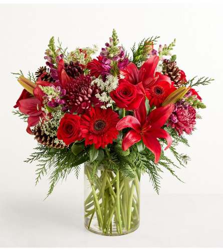 Abundant Christmas Blessings™ - Deluxe. An arrangement by Flowers of Jacksonville.