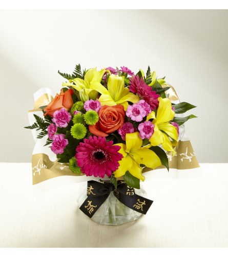 ​The FTD® Bold Beauty™ Hand-tied Bouquet - Standard. An arrangement by Grower Direct Acadia.