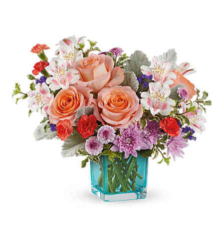 The Teleflora's Enchanting Garden Bouquet - Deluxe. An arrangement by Marivel's Florist and Gifts.