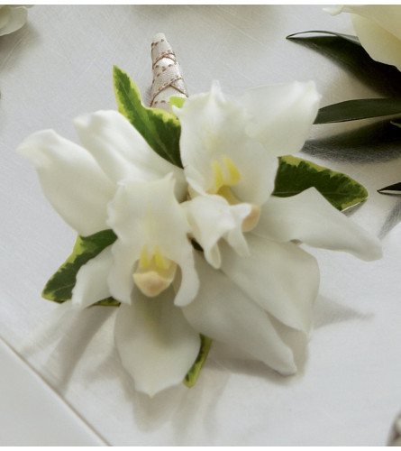 The FTD® White Mini Cymbidium Boutonnier