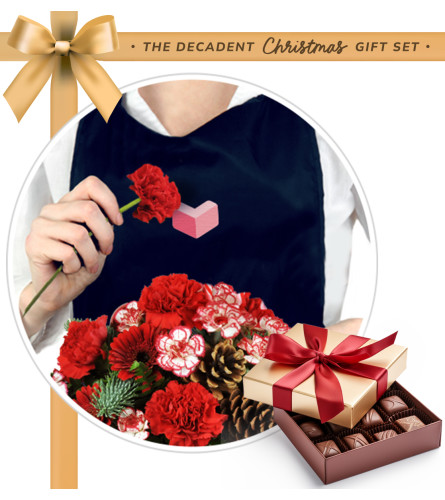 Very Merry Bouquet and Chocolates Bundle. An arrangement by Marianne's Floral Garden. Your gorgeous Christmas flowers include the designer's...