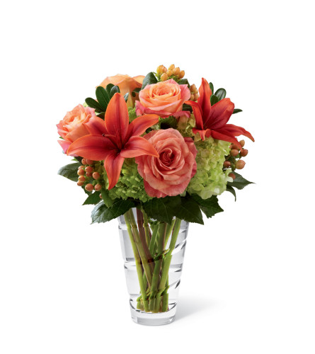 The FTD® Dawning Delight™ Bouquet - Standard. An arrangement by Grower Direct Acadia.