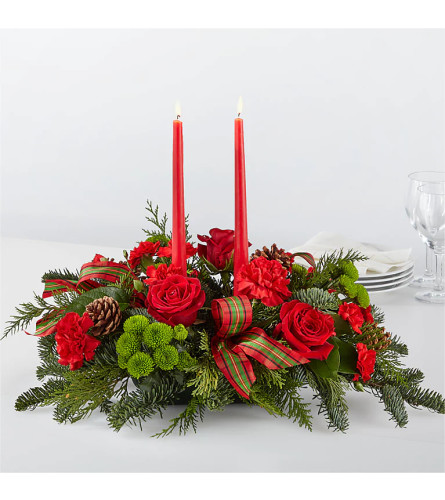 By the Candlelight Centerpiece - Deluxe. An arrangement by Syd Kemsley Florist.