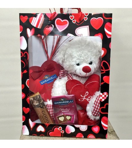 I Love You Grab Bag. An arrangement by Clark's House of Flowers.