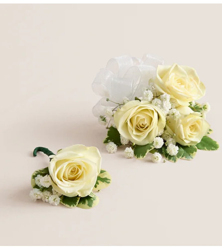 White Spray Rose Corsage and Boutonniere - Standard. An arrangement by Sicola's Florist. Delivery Instructions.