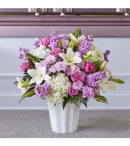 A Heaven Sent Floor Basket - Deluxe. An arrangement by Sueppel's Flowers.
