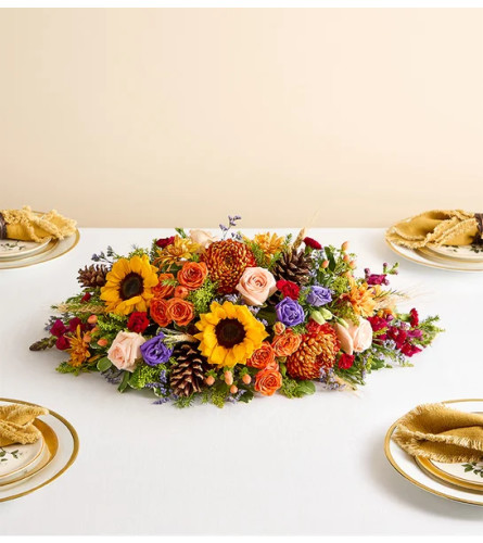 Crisp Fall™ Centerpiece - Standard. An arrangement by Flowers of Jacksonville.