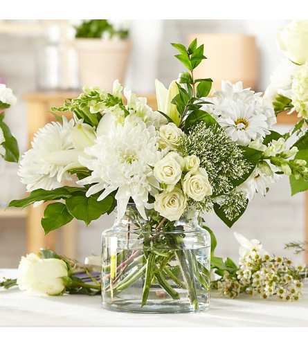 The Classic Ivory – A Florist Original - Deluxe. An arrangement by Syd Kemsley Florist.