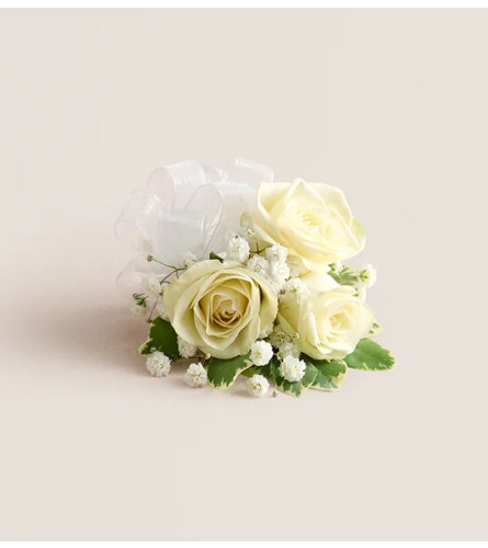 White Spray Rose Corsage - Standard. An arrangement by Flowers of Jacksonville. Delivery Instructions.