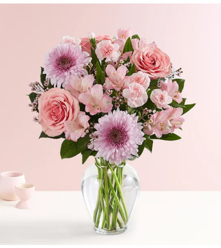 Budding Romance - Standard. An arrangement by Flowers of Jacksonville.