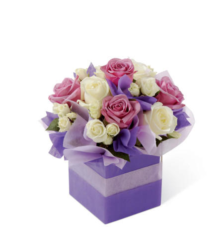 The FTD® Pure Romance™ Rose Bouquet - Standard. An arrangement by Royal Louis Florist.