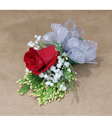 Simplicity Boutonniere. An arrangement by Langdon Florist of Tribeca.