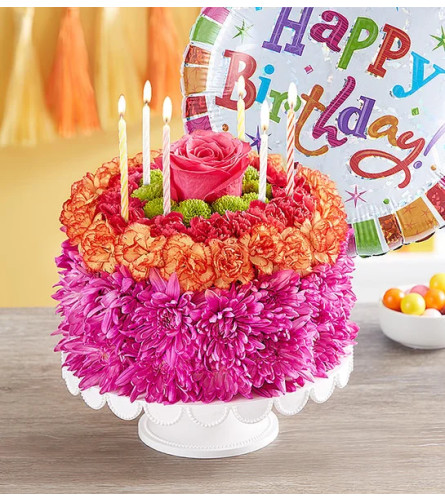 Birthday Wishes Flower Cake® Vibrant - Deluxe. An arrangement by Susana's Flowers.