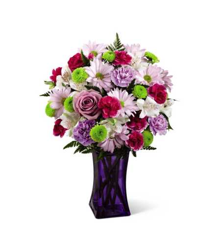 The FTD® Purple Pop Bouquet - Standard. An arrangement by Grower Direct Acadia.
