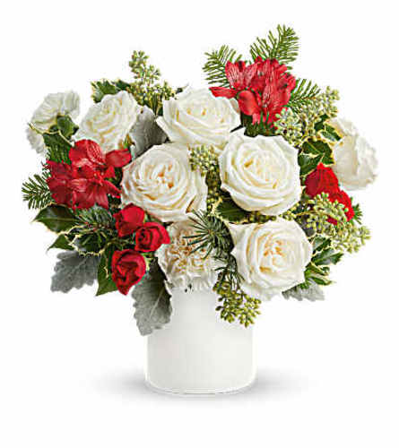 The Teleflora's Holiday Joy Bouquet - Deluxe. An arrangement by Marivel's Florist and Gifts.