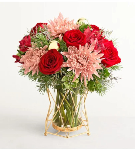 Christmas Popper™ - Deluxe. An arrangement by Flowers of Jacksonville.