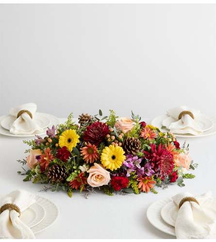 The Crisp Fall™ Centerpiece - Deluxe. An arrangement by Flowers of Jacksonville.