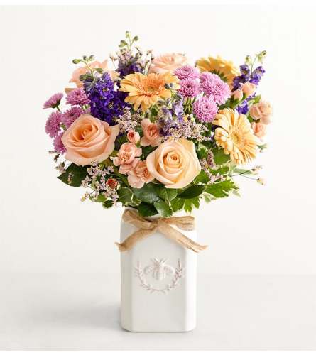 The Honey Bee Buzz™ - Deluxe. An arrangement by Flowers of Jacksonville.